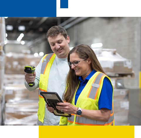 Employees cataloging warehouse